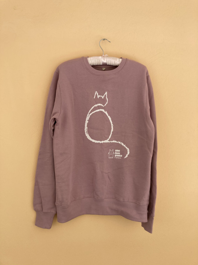 A sweatshirt, in old rose color, with the white outline of a cat over the Nine Lives Logo